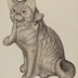 sculpture of a cat with a pipe in its mouth